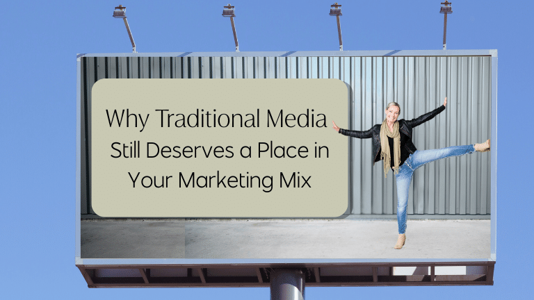 An outdoor billboard features Amanda Roberts kicking in excitement with the words "Why Traditional Media Still Deserves A Place In Your Marketing Mix" displayed on a green background.